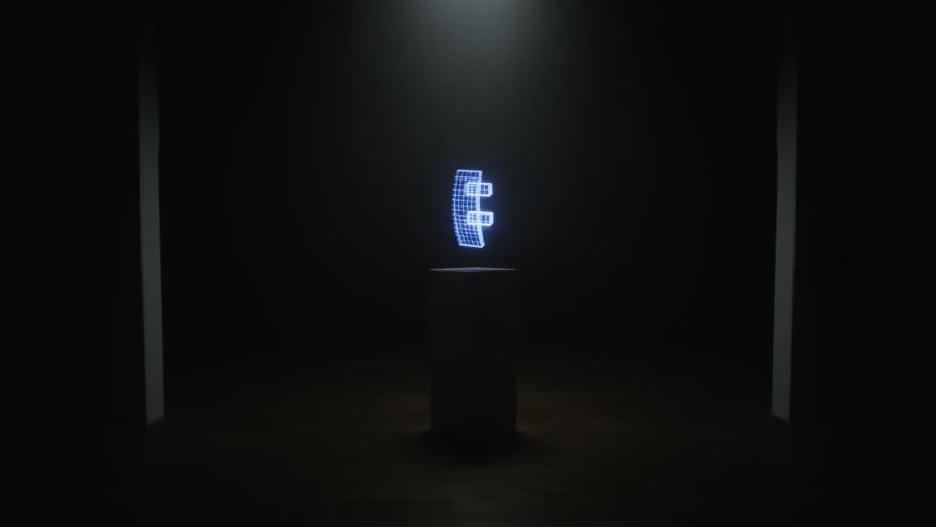 A digitized holographic sideways smiley face rotates over a pedestal in a dark room