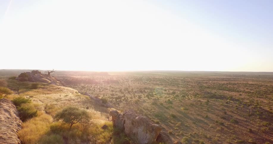 The cliff is covered with grass