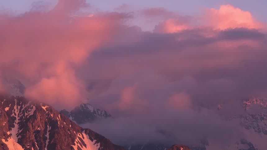 The clouds move over the mountains