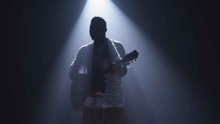 A person is playing guitar
