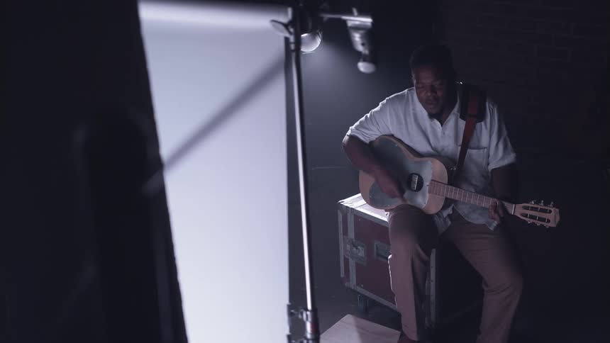 A person is playing guitar