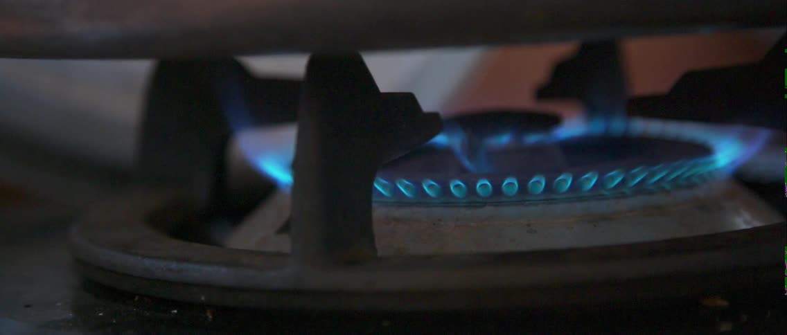 A stove burner briefly turns on