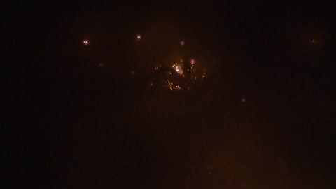 The campfire is giving off sparks