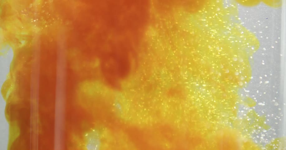 Orange liquid swirls around
