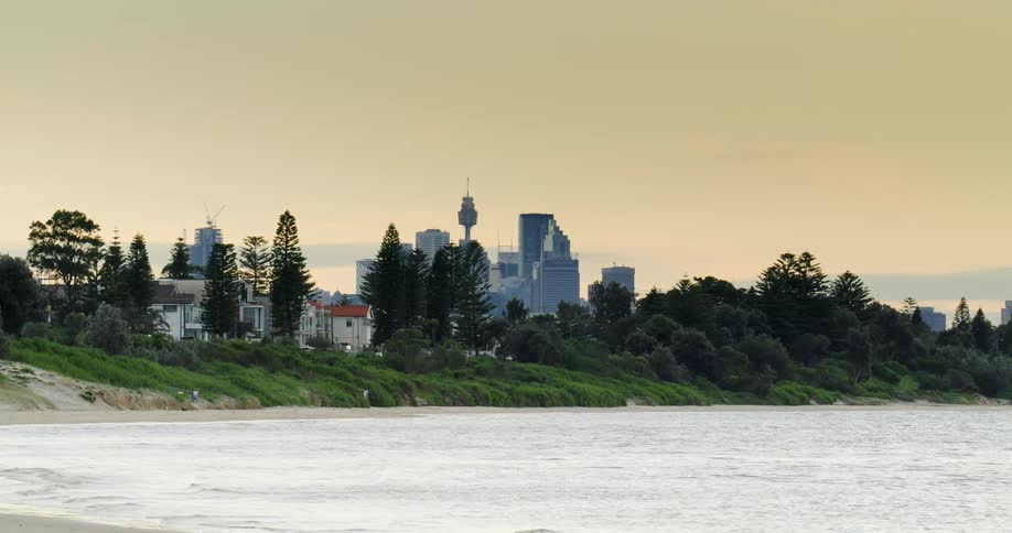 An urban city is near the beach coast