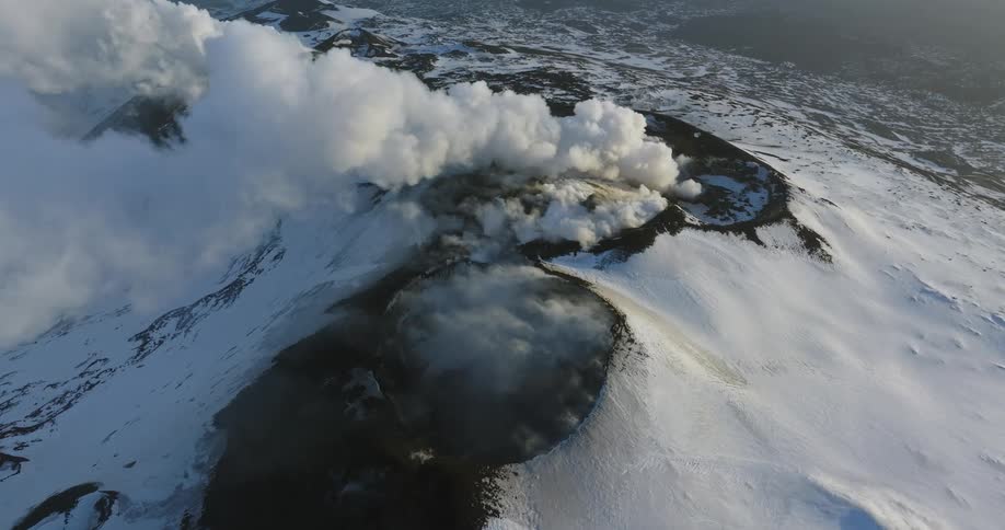 Aerial view of an eruption is displayed in winter
