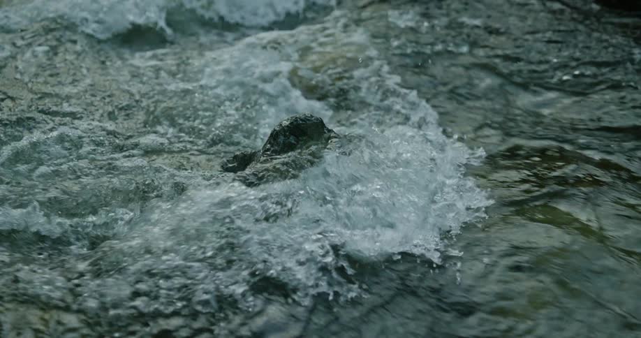 The water flows over the rocks