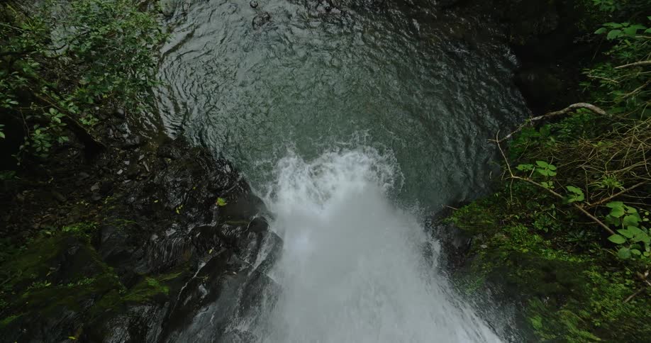 Aerial view of waterfall cascading down