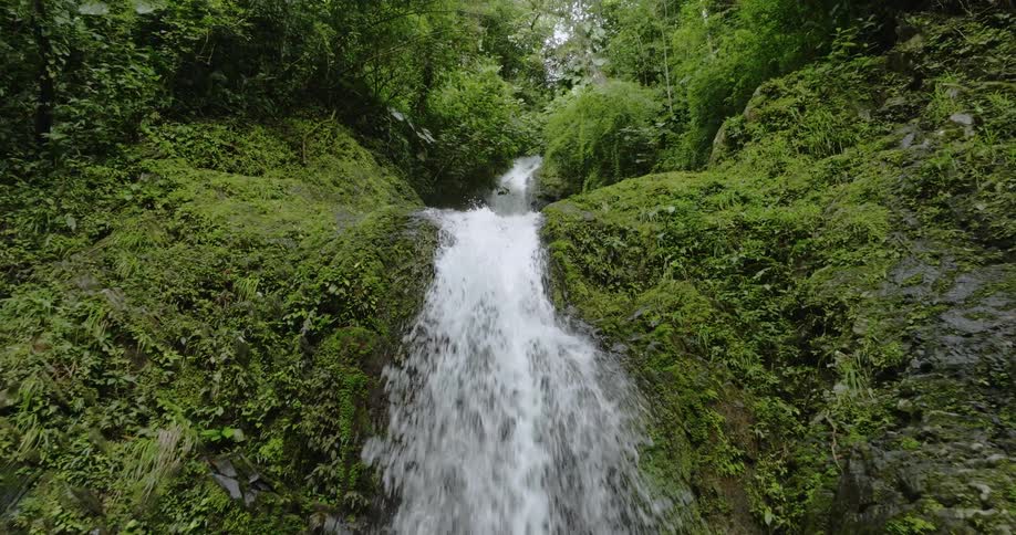 Close up view of a waterfall during spring is displayed