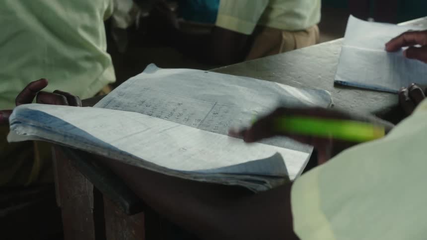 Close up of the notebook of a boy studying on a third world country school