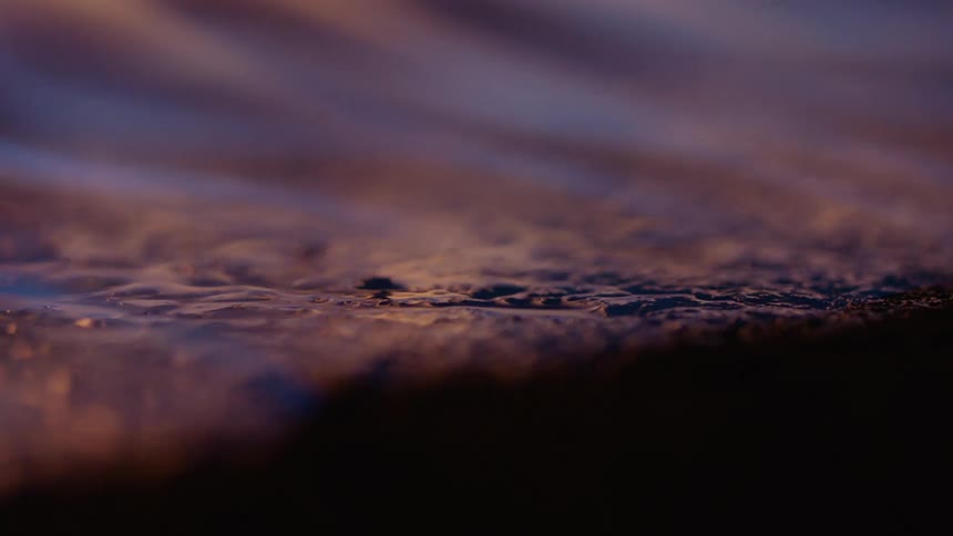 Flowing lines flow over textured surface