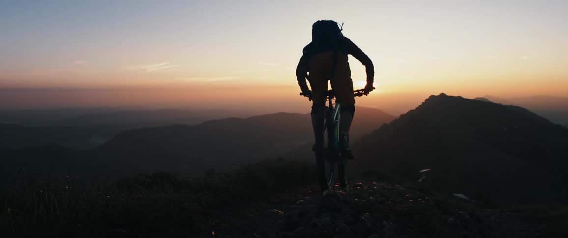 The view is someone riding there bike outdoors