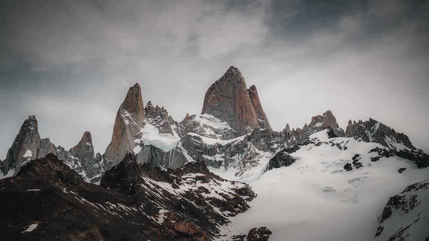 Aerial view of mountains during winter is displayed