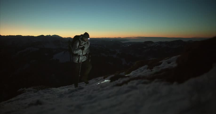 Man hiking up a snow mountain