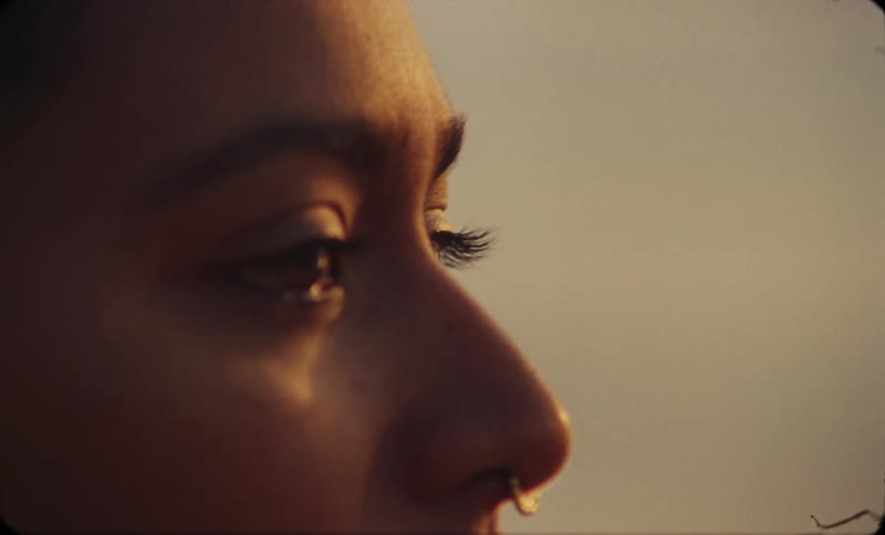 Close up view of a woman outdoors at dusk