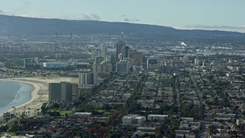 Aerial footage of downtown Long Beachs office high-rises during a hazy day in Southern California