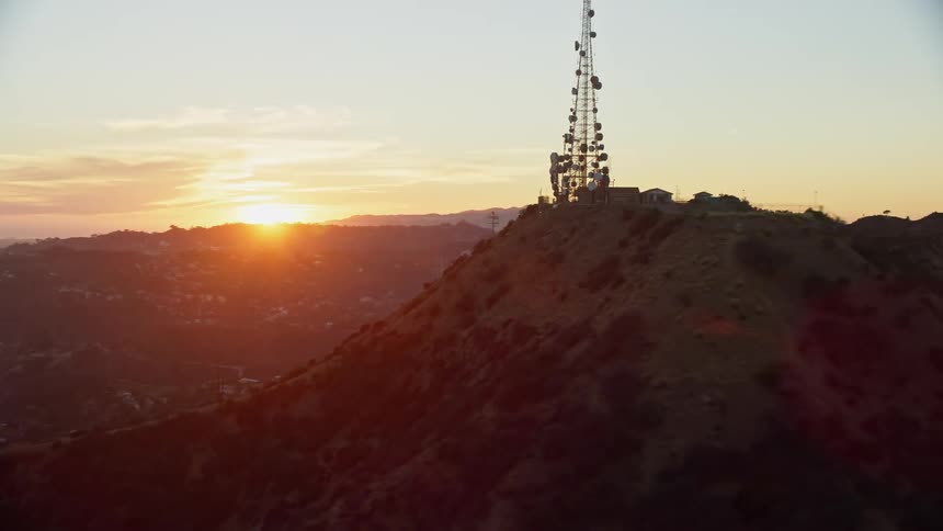 Approaching the iconic Hollywood Sign at twilight in Los Angeles California