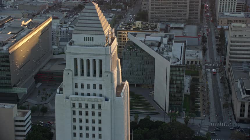 The LAPD headquarters is being orbited during twilight in this aerial footage of Downtown Los Angeles California