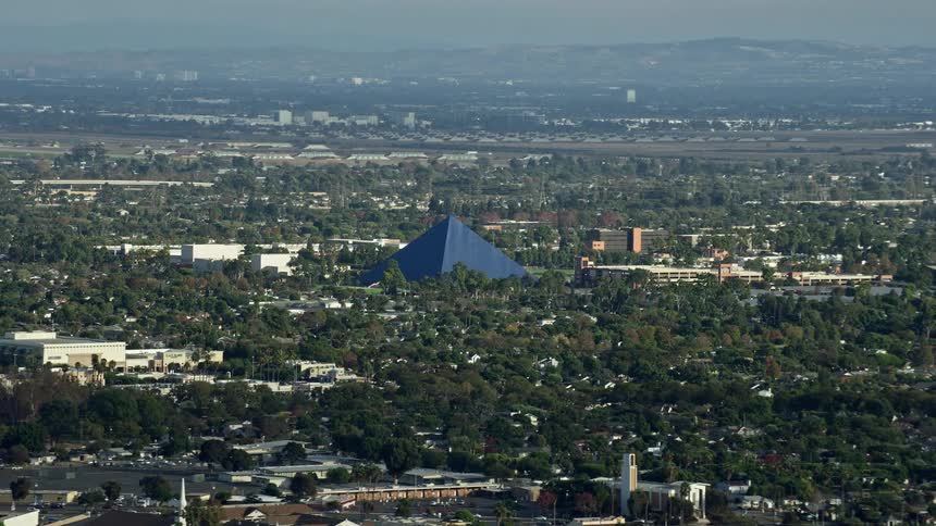 Aerial footage of the Walter Pyramid at California State University Long Beach on a hazy day