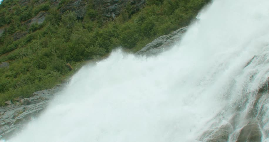 Landscape of high waterfall cascading down