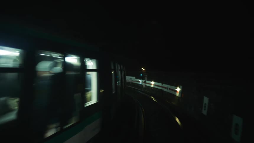 Subway train running through tunnel