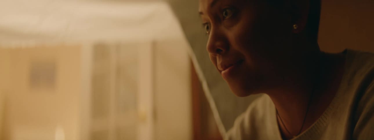 A woman is smiling