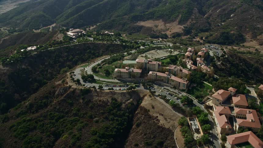 Aerial footage of Soka University of America located in the hills of Aliso Viejo California on a sunny day
