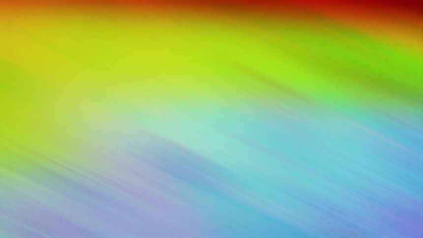 Rainbow colors blended together moving slowly and creating ripples in the colors