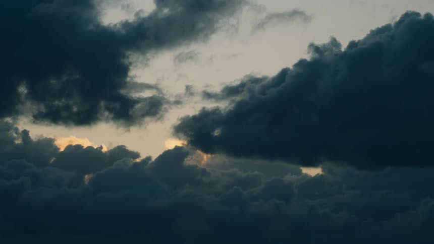 Dark clouds floating in the sky at evening