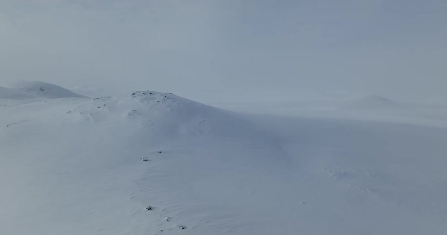 A snowy arctic landscape during winter is displayed