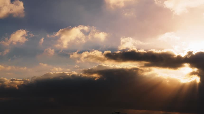 The view is of the clouds and the sky in the day time