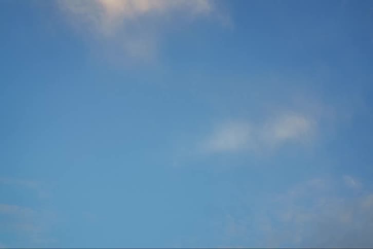 The view is of the sky and you can see the clouds