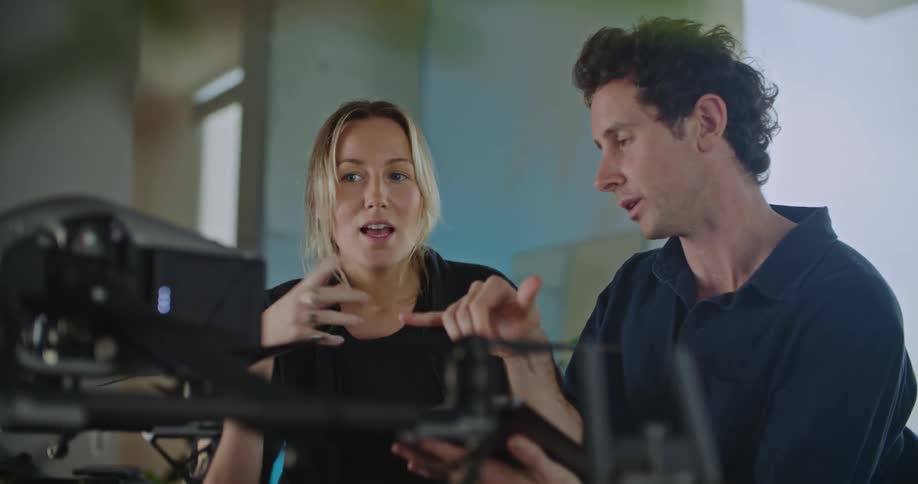 Young couple is indoors and is talking to each other