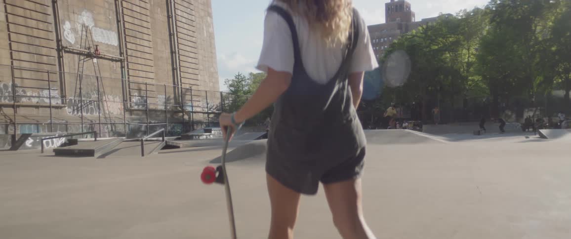 Woman Skateboarding In New York