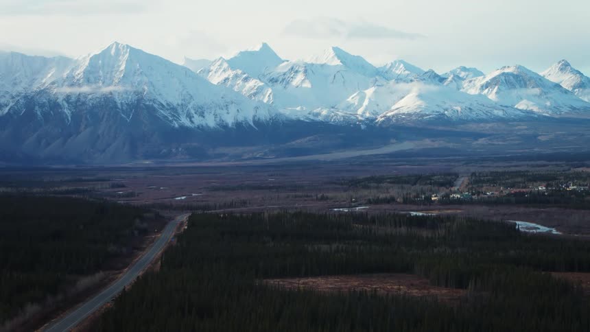 Mountains in the horizon is displayed during winter