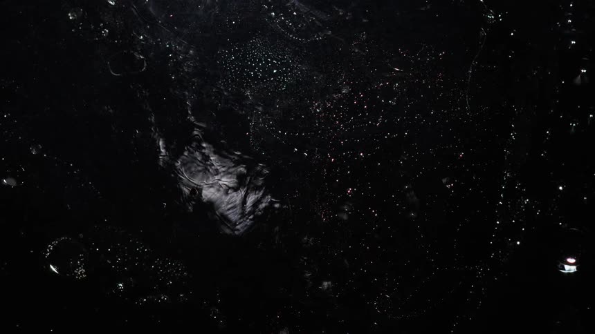 A star covered sky against a black night with special effects changing the imge