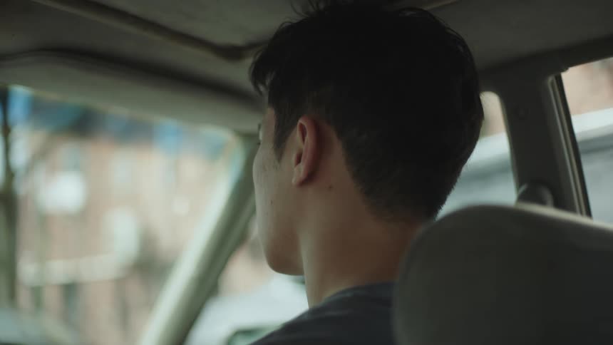 A man is sitting in the car