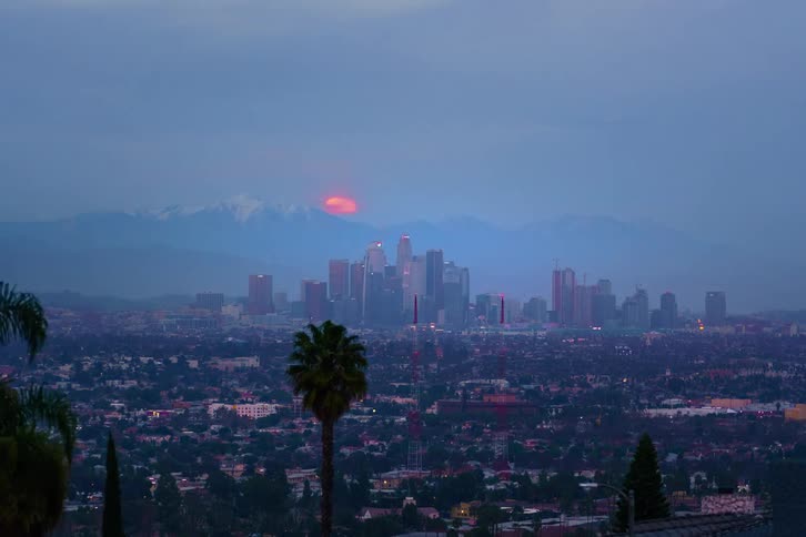 A time lapse of a sunset and the moon over Los Angeles