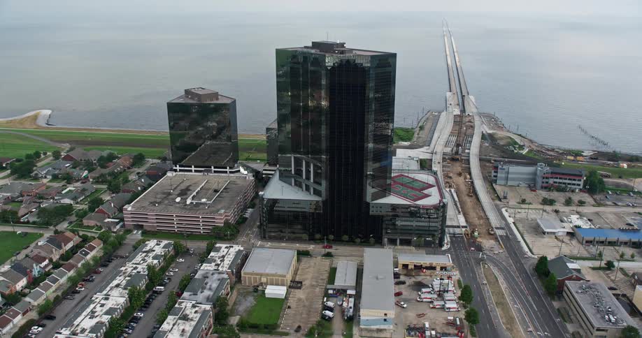 An aerial view of Lakefront Hotel and surrounding office buildings orbiting in Metairie New Orleans Louisiana