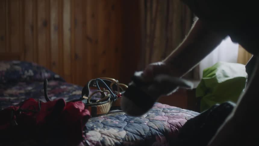 A man is unpacking a bag
