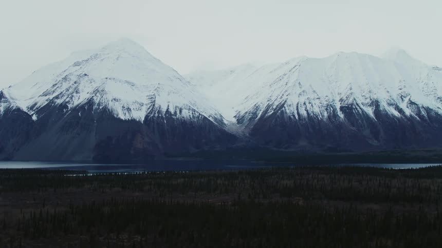 A mountain landscape is shown in the horizon