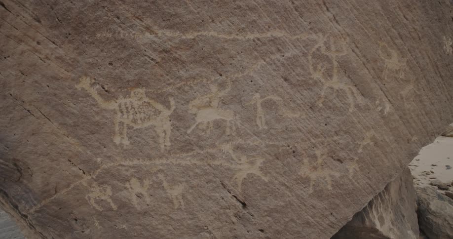 Ancient drawings on an old rock face in Saudi Arabia