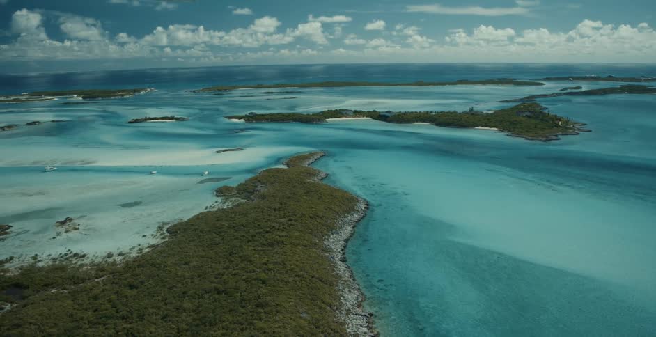 Aerial view of islands in the middle of the ocean on a cloudy day