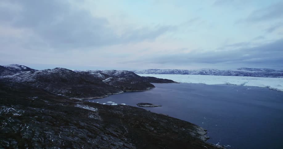 Aerial view of the ocean and coast during winter season