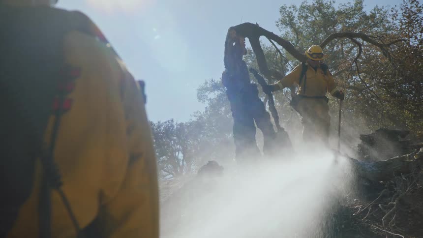 Firefighters are putting out a fire