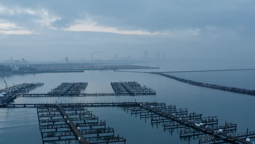 Boats docks at a pier in a lake
