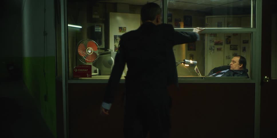 A man stumbles towards a security office