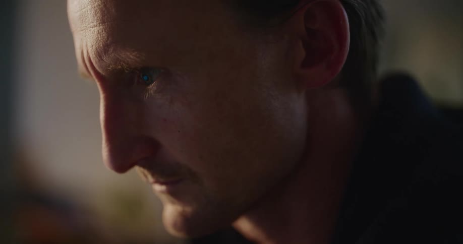 A man is examining something