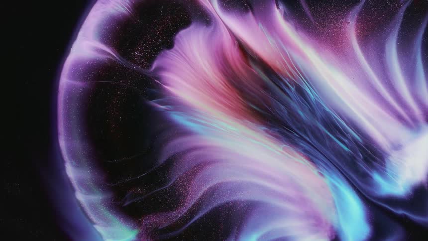 A pastel purple sphere grows larger and explodes into a swirl pattern