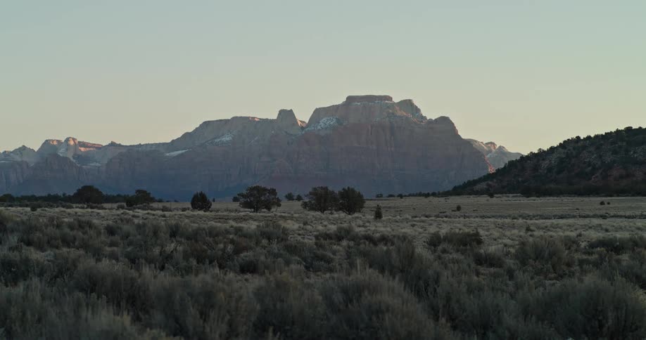 Panoramic view of a desert mountain range in the horizon in the morning
